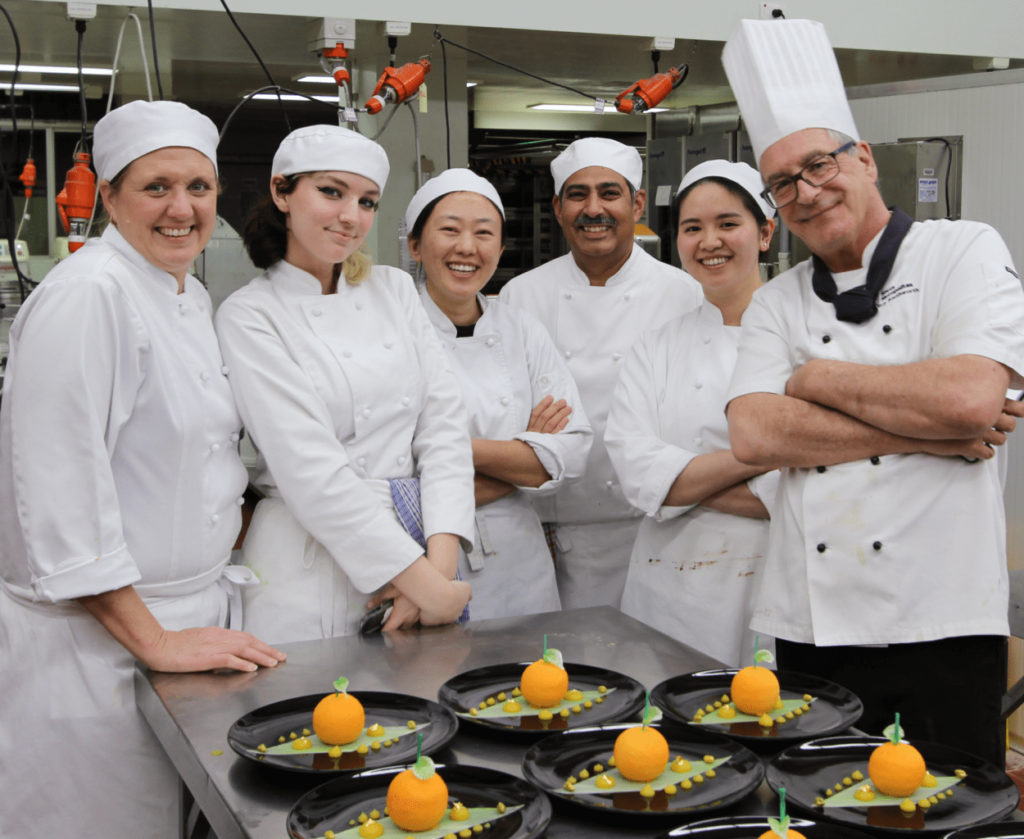 Staff and students at South Metro TAFE Bentley Training Kitchen.